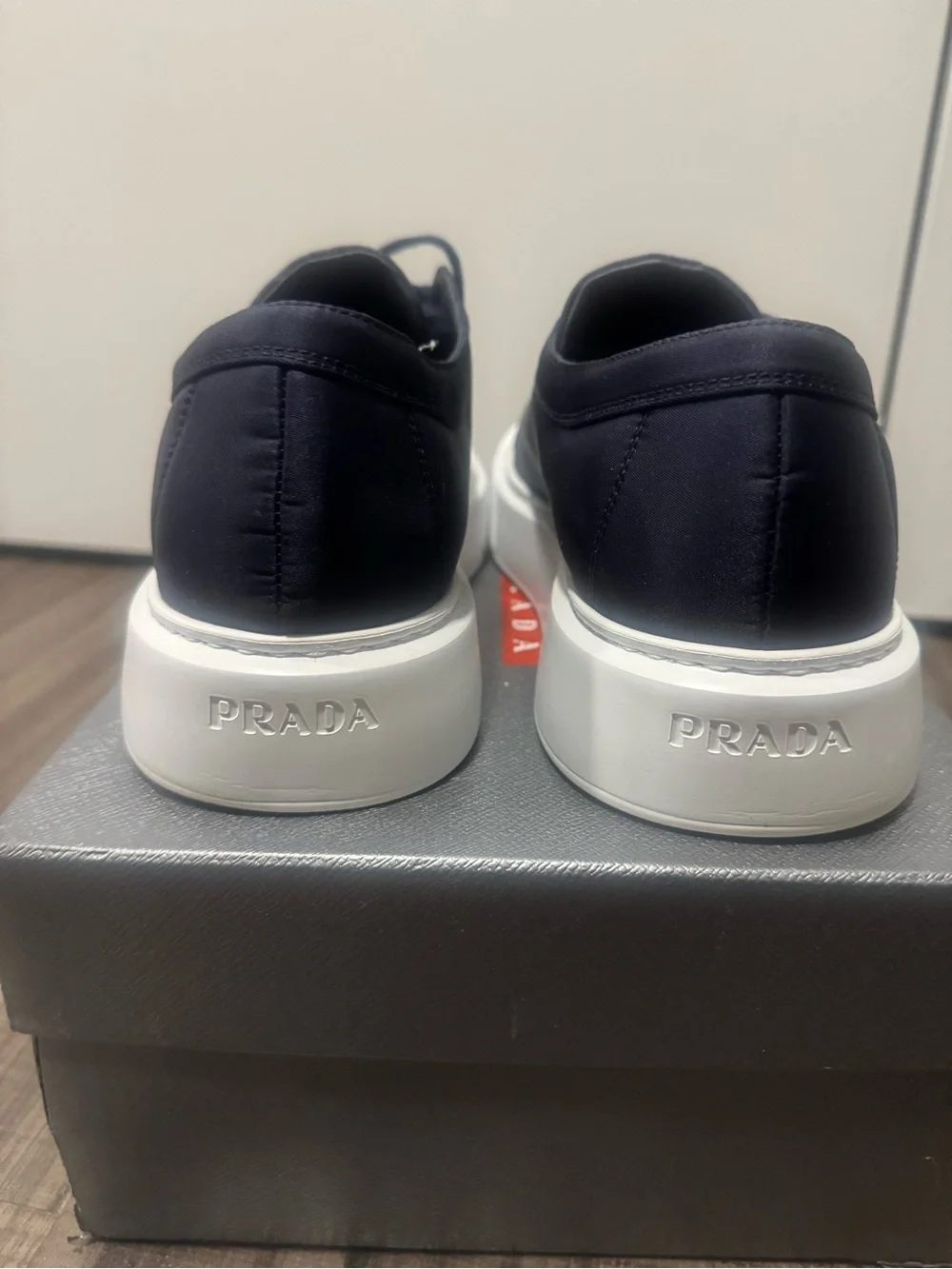 Prada Navy Sneakers with Yellow Logo Patch and White Platform Sole
